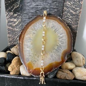 Bracelet with clear crystals in 14k YG, 8G wt.